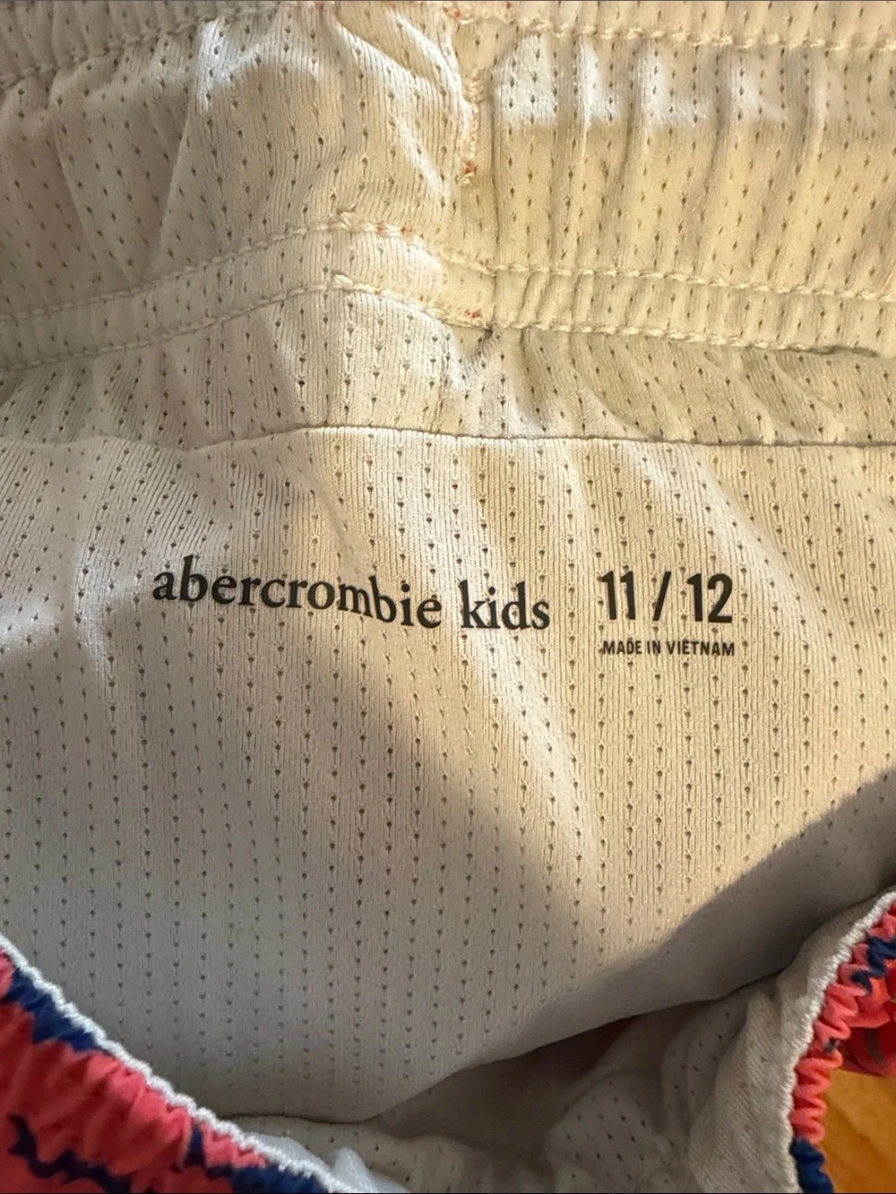 Abercrombie kids coral Swim Trunks with Blue Fish Print size 11/12